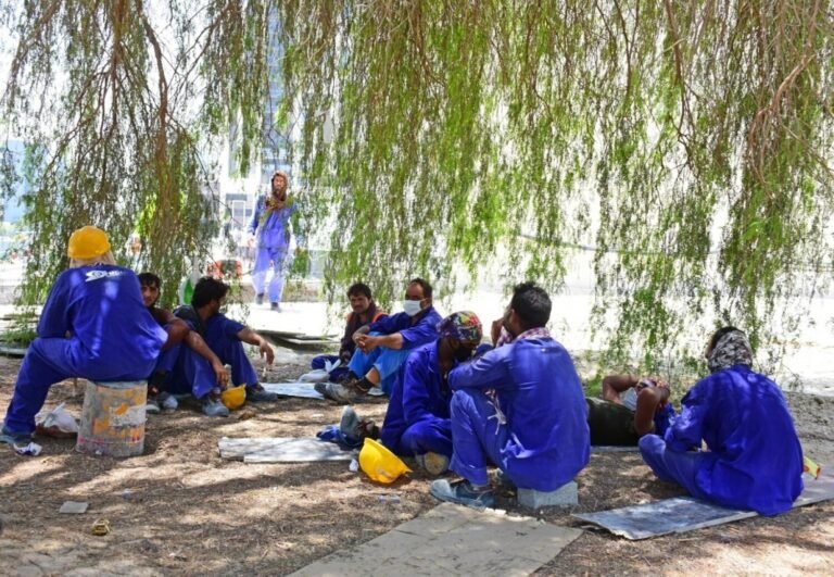 UAE Summer: Health Packages and Umbrellas Distributed to Workers in Global 'Water Aid Initiative'